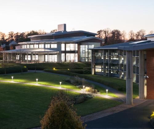 A photo of the centenary building at Rothamsted lit up